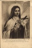 CPA La B Therese de L'Enfant Jesus couvrant son crucifix de rose 