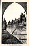 CPA L'Aude La Cite de Carcassonne Remparts et Fosses vus du Pont Levis de la Porte Narbonnaise 