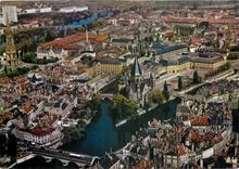 CPM Metz Lorraine Sur l'une des iles de la Moselle Le Temple Neuf et la Place de la Comedie 