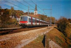 CPM Palaiseau (Essonne) Passage de la Ramez Z 8169 du R.E.R devant l'Eglise Saint-Martin de Palaisea