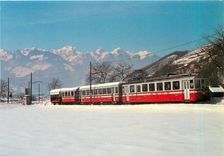 CPM Train de voyageurs de l'A.O.M.C. a Olion en Frevier 1985