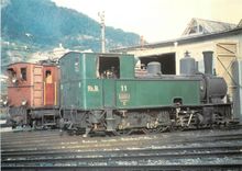 CPM Ge 4/6 302+ G 3/4 11 ''Heidi'' au depot de Landquart 15.10.1966