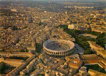 CPM Nimes Gard Vue generale de la ville par avion au centre les arenes 