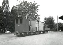 CPM Tracteur Te 2/2 2 avec deux wagons en gare de Lausanne-Chauderon 30.6.1958