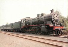 CPM Locomotive à vapeur type 64 avec voitures SCI