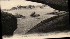 Tregastel CPA the beach seen between the rocks