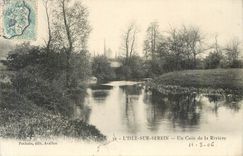 CPA UN L'ISLE SUR SEREIN.Un coin de la Riviere Moulin