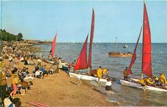 CPM Leigh On Sea Catamaran Sailing boats prepare to leave the beach at Leigh near Bell Wharf Bateaux