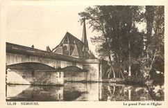 CPA Nemours le grand pont et l'Eglise 