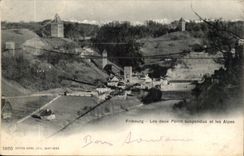 Suisse Fribourg CPA Les deux ponts suspendus et les Alpes