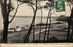 Surroundings of Plestin Strikes CPA the beach of St Efflam and the large rock through the fir trees