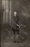 Real photo young man and bicycle (cycle cyclist)