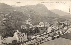 CPA Lourdes the basilica seen from of the railroad