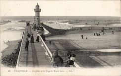 CPA Trouville the pier and the beach has low tide