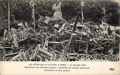 CPA Militaria Paris July 14th 1919 Rond point of the Fields elysees Pyramide of the German guns surmount French cockerel