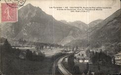 CPA Cauterets the Pyrenees Road of Pierrefitte Entrance of Cauterets Peaks of Peguere and Monne