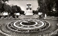 Reloj floral de CPA Argel y el monumento de la guerra