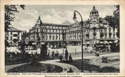 CPA Wiesbaden Blick vom Blumengarten vor dem Kurhaus auf Nassauer Hof