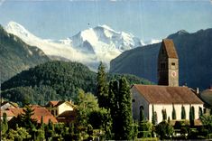 CPA Interlaken Kirche Unterseen mit Monch und Jungfrau 