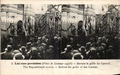 CPA the streets pavoisees Lisieux In front of the grid of Carmel September 30th 1925