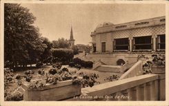 CPA Le Casino Et Un Coin Du Parc Vittel