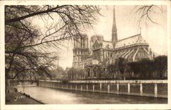 VINTAGE POSTCARD Paris While Strolling Our lady and the Public garden of L Archbishop s palace Notre Dame and ArchevecheSuare