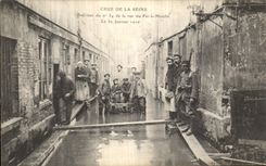 VINTAGE POSTCARD Crue Of the Seine Paris Interieur of number 34 the Street of Iron has Moulin