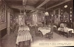 VINTAGE POSTCARD Fashionable country inn of the Old Cords Interior of dining room