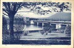 VINTAGE POSTCARD Hendaye Edges Of Bidassoa and the international bridge of the tram