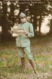 VINTAGE POSTCARD Militaria Soldier the newspaper