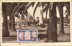 CPA Nice palais de la jetee a travers les palmiers