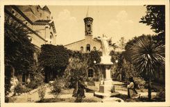 VINTAGE POSTCARD Ile Saint Honoured Jadin Monastery with the virgin in the center of the old cloister