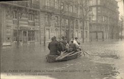 VINTAGE POSTCARD Paris Floods In boat with the boulevar Haussmann