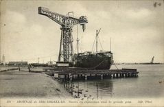 VINTAGE POSTCARD Boat War Arsenal of Sidi Abdallah Ship in repair under the large crane