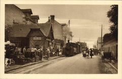 VINTAGE POSTCARD Lion sur Mer Train station and the train of Caen to the sea