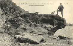 Alrededores hombre y perros de Arromanches de la POSTAL de la VENDIMIA