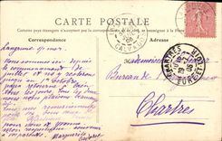 La POSTAL Arromanches de la VENDIMIA la playa y las tiendas tiene marea baja