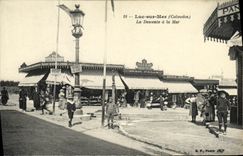 POSTAL Lucas de la VENDIMIA en pendiente del mar con el bazar de Felix de la casa del mar