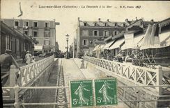 POSTAL Lucas de la VENDIMIA en pendiente del mar con el mar