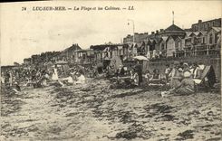 POSTAL Lucas de la VENDIMIA en el mar en la playa y las cabinas