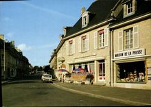 CPM Aunay sur Odon Rue de Caen Maison de la Presse Hotel Restaurant St Michel