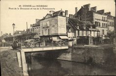 VINTAGE POSTCARD Cop On Noireau Bridge of Drouance and street of the Fish shop