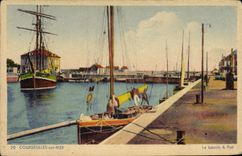 VINTAGE POSTCARD Courseulles On Mer the wet dock Bateaux