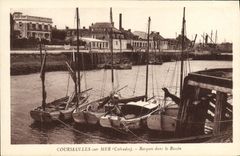 VINTAGE POSTCARD Courseulles On Sea Boats in the Basin Boats