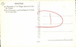 Tableros de Deauville de la POSTAL de la VENDIMIA y la playa delante de la barra del Sun