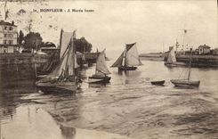 La POSTAL Honfleur de la VENDIMIA tiene barcos de la marea baja