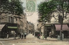 VINTAGE POSTCARD Puteaux Street Restoring Voltaire