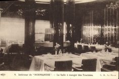 Barco interior de la POSTAL de la VENDIMIA del comedor del vapor de Normandía de los turistas