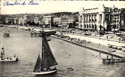 VINTAGE POSTCARD Nice hotels and the beach Boat