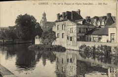 CPA Lisieux Vue sur la Touques et l'eglise saint desir